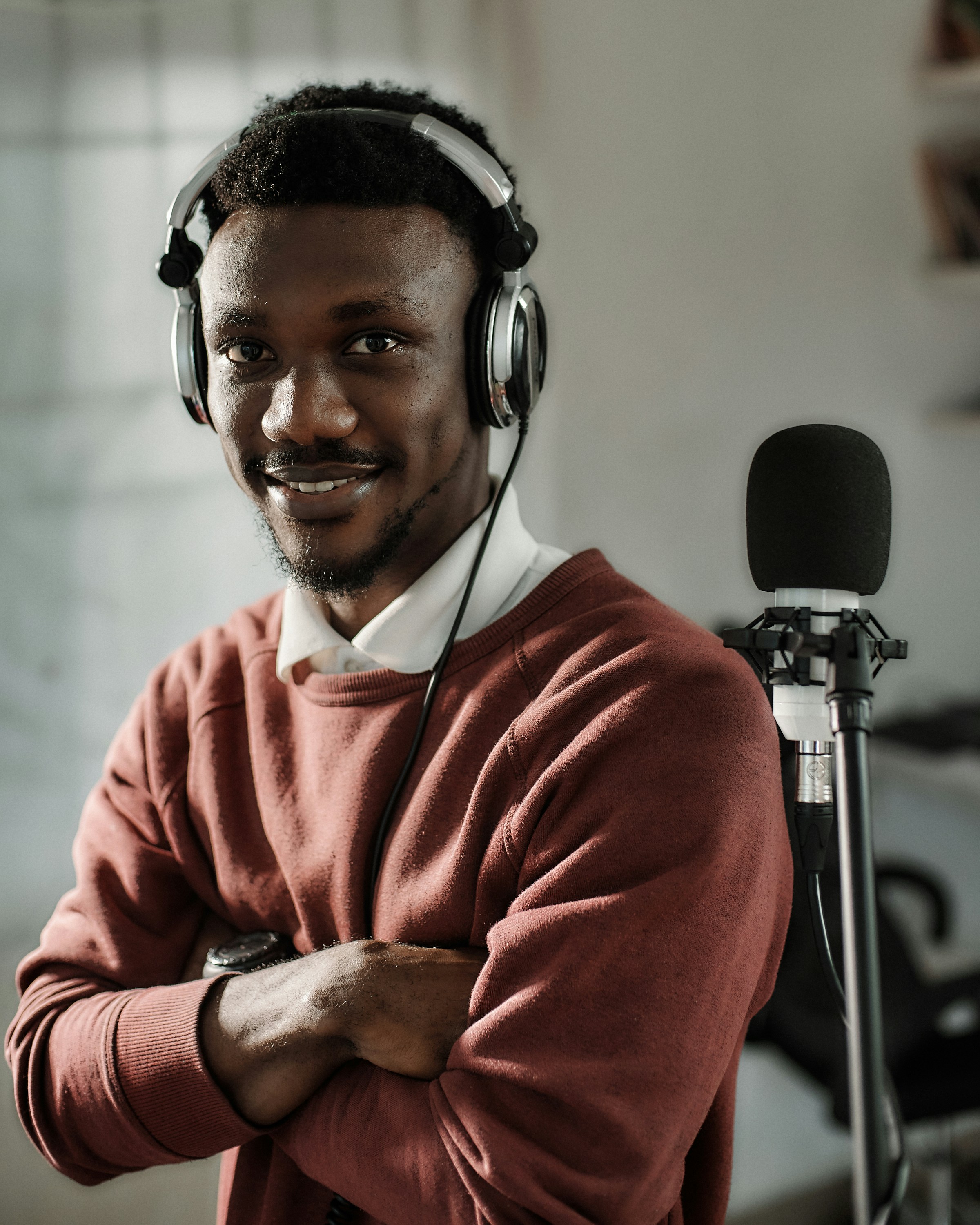 Podcast Host - Photo by 
            Emmanuel Ikwuegbu on Unsplash